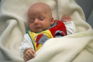 Three-weeks-old baby sleeping MR